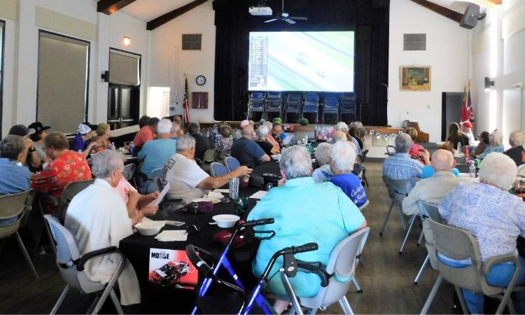 Moosehaven residents gather to watch NASCAR