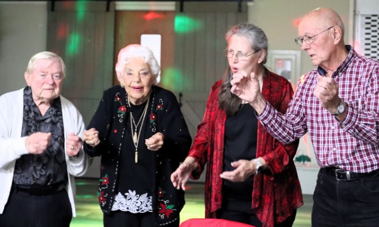 resident-xmas-blog residents singing and enjoying the resident christmas party at the moosehaven 2025