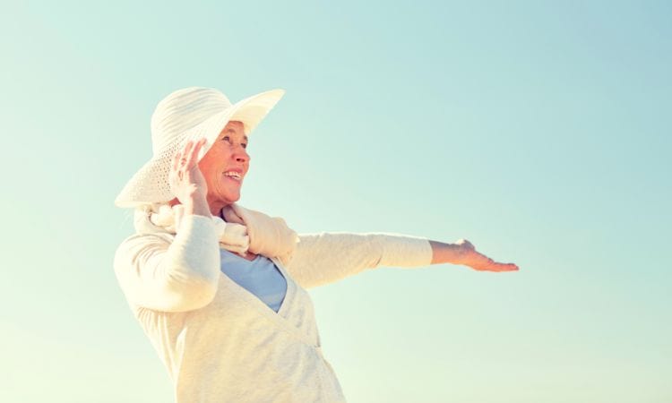 Woman wearing hat in the sun